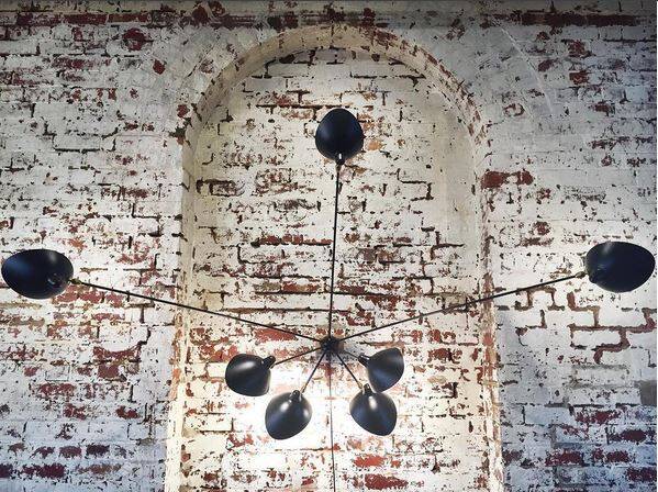 Spider wall light with seven fixed arms