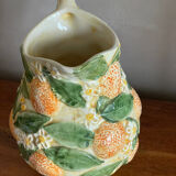 Orange slipware pitcher