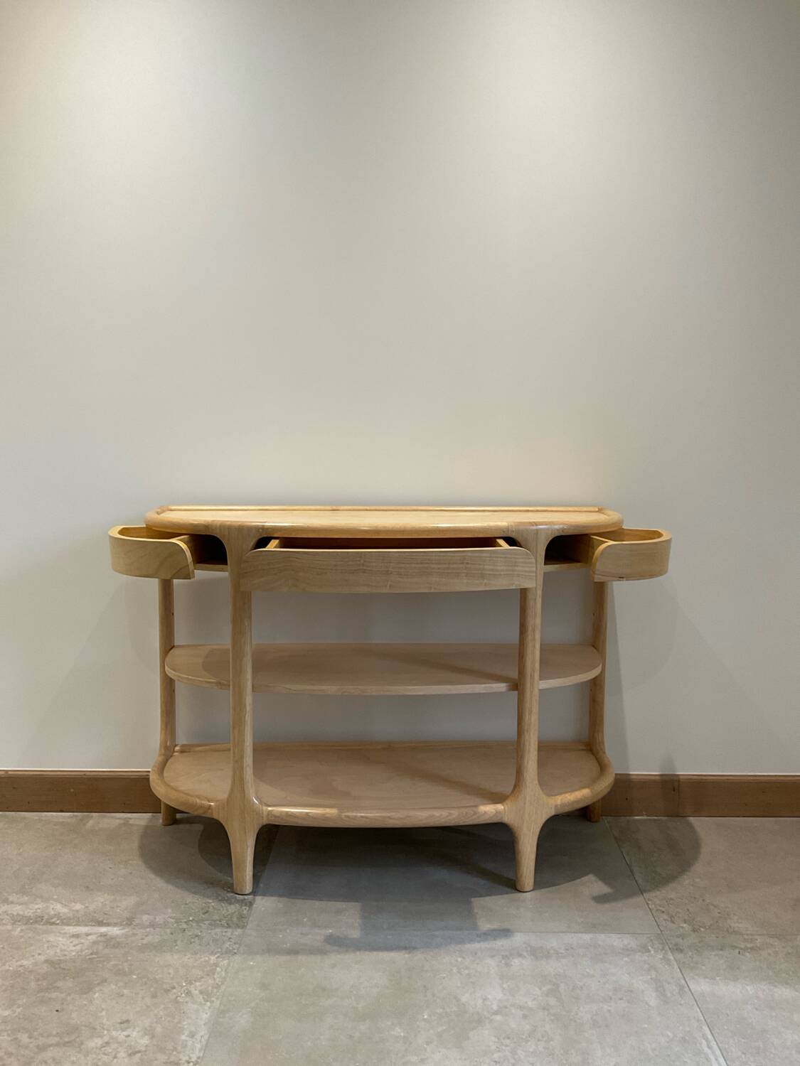 Contemporary console in ash wood.