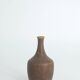 Set of 4 Scandinavian collectible vases in brown stoneware by Gunnar Borg.