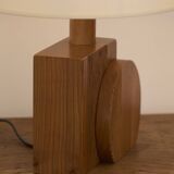 Pair of geometric handcrafted lamps in solid oak circa 1970.