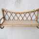 Rattan wall shelf from the 60s