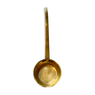 Golden brass ladle