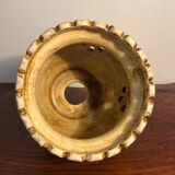 Ceramic suspension with openings