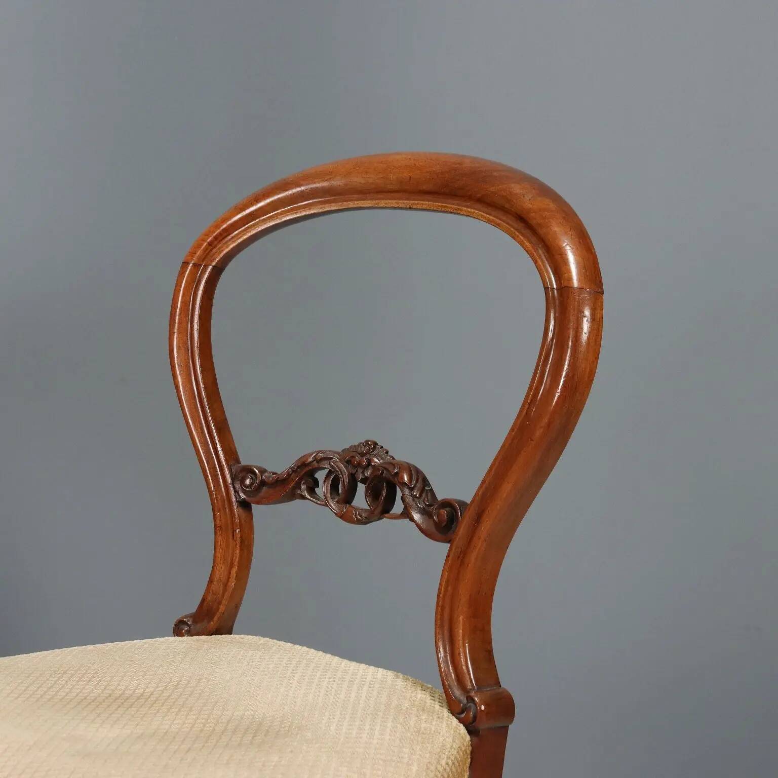 Antique walnut chairs with upholstered seats, Italy, mid-19th century.