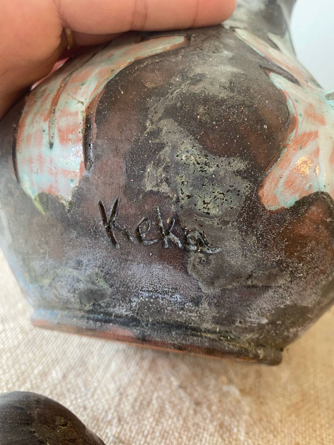 Enamelled terracotta teapot signed Keka
