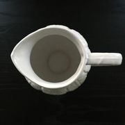 White slipware pitcher
