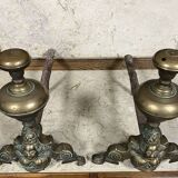 Pair of Louis XIV period andirons in gilded bronze circa 1700