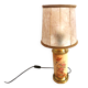 Old ceramic lamp "Lunéville" with a pig bladder shade.