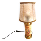 Old ceramic lamp "Lunéville" with a pig bladder shade.