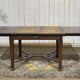 Art Nouveau dining table in mahogany in the style of Gustave Serrurier-Bovy.