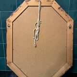 Vintage beveled mirror with floral frame