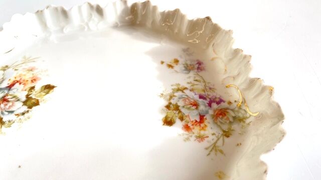 Old tray in floral pattern biscuit