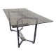 Table en métal chromé dessus verre fumé