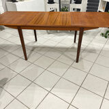 Large extendable Scandinavian table in vintage teak from the 1970s.