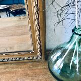 Gilded and beveled pier mirror 88x58cm