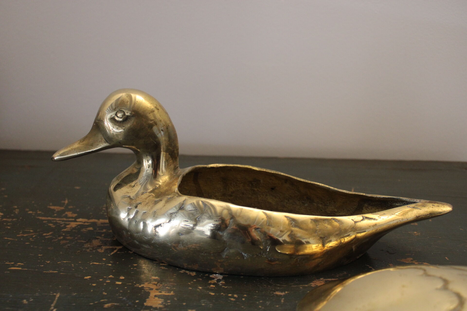 Empty pocket vintage brass duck