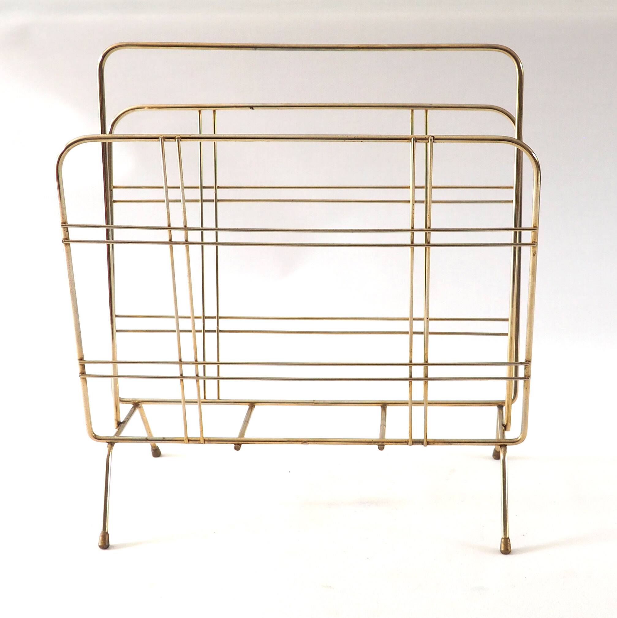 Gold metal magazine rack