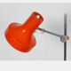 Orange metal floor lamp published by napako around 1970