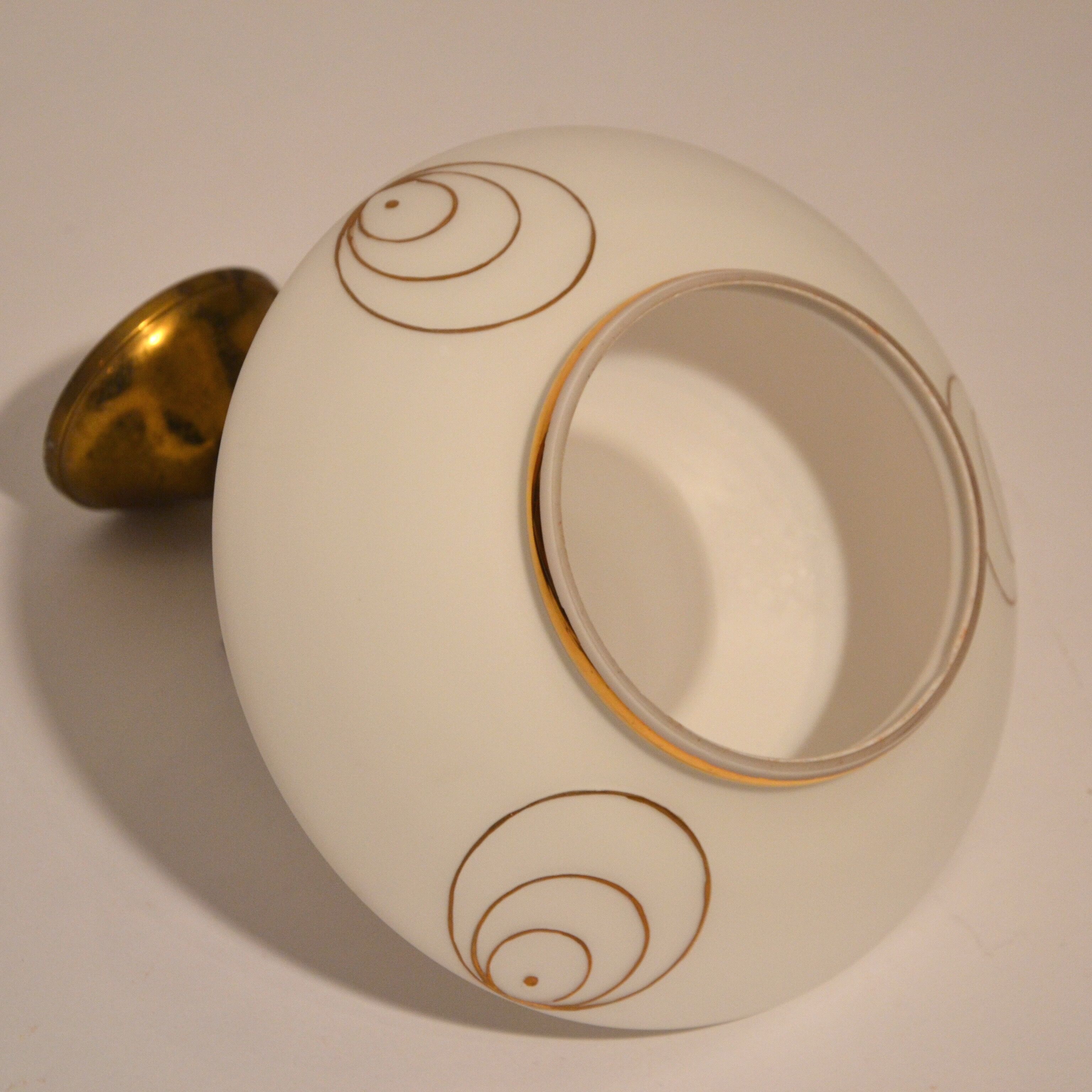 White and gold suspension