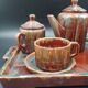 Tête-à-tête coffee service in Puisaye stoneware signed Louis Cagnat, Art Deco