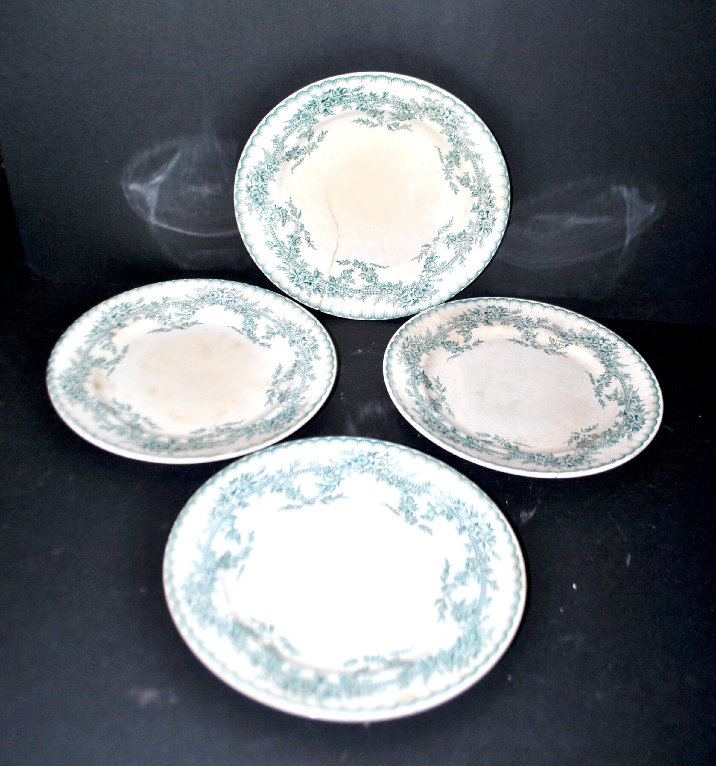 Onnaing Faïencerie set of 4 Coppelia plates with green floral decoration, iron earthenware