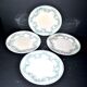 Onnaing Faïencerie set of 4 Coppelia plates with green floral decoration, iron earthenware