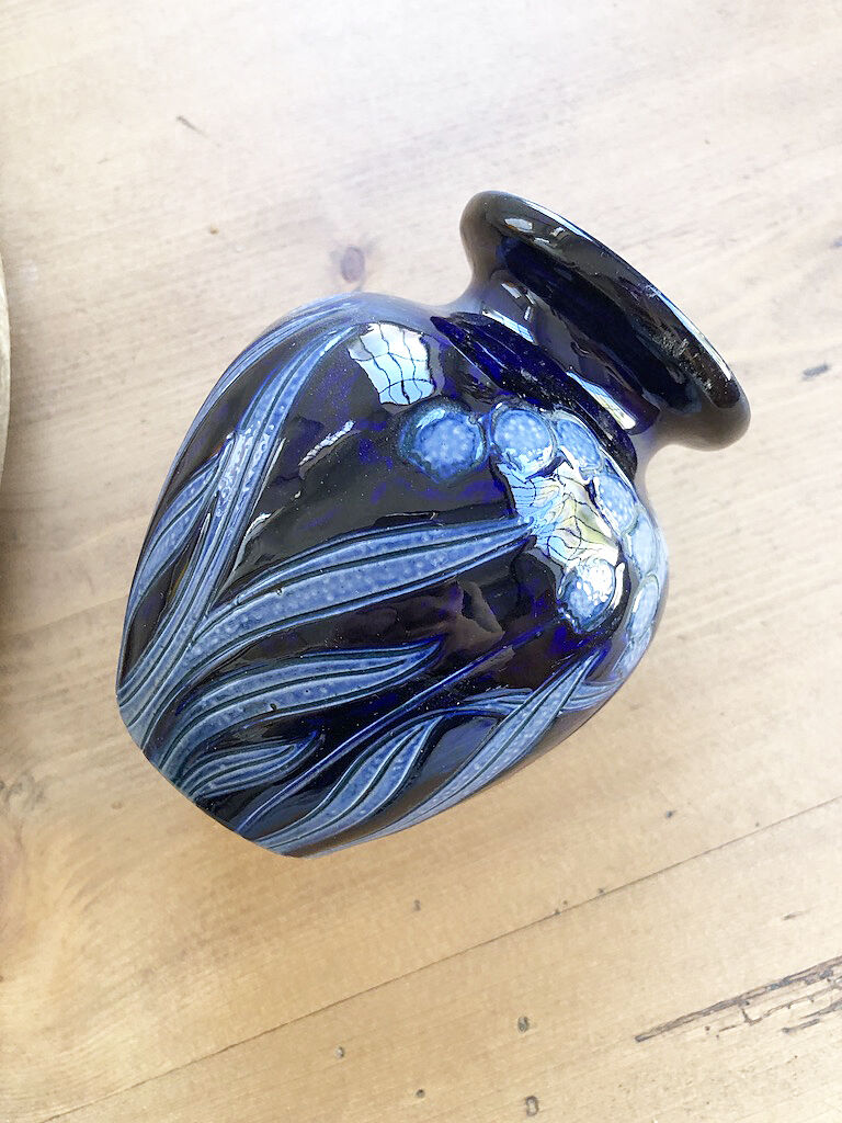 Artisan vase with floral motifs