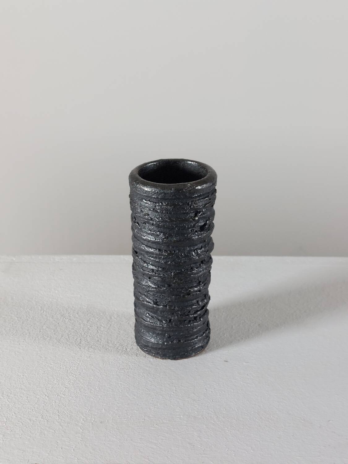 Small vintage brutalist vase with oxidised glaze from the 1950s.