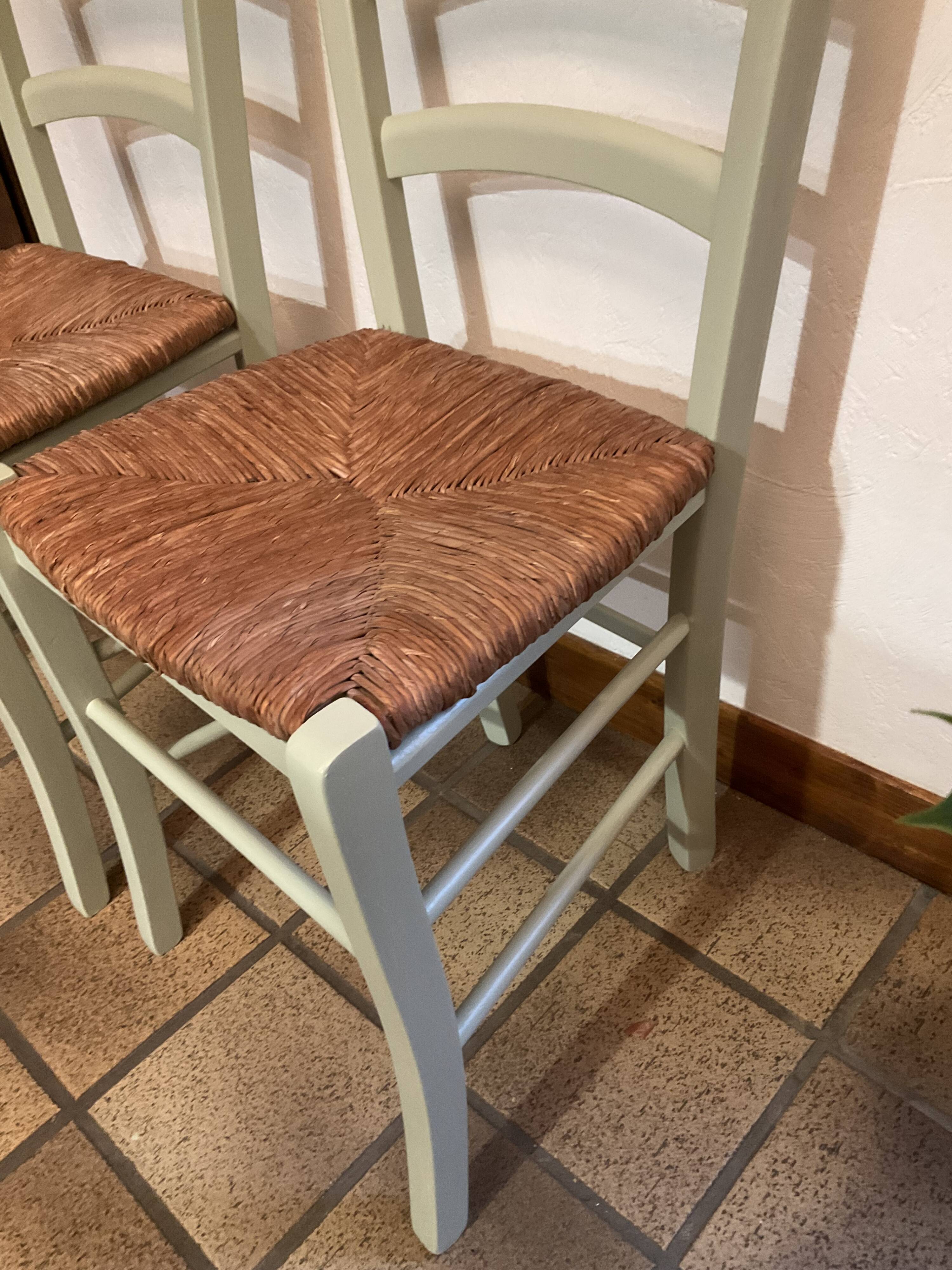 Pair of green straw chairs