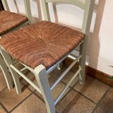 Pair of green straw chairs