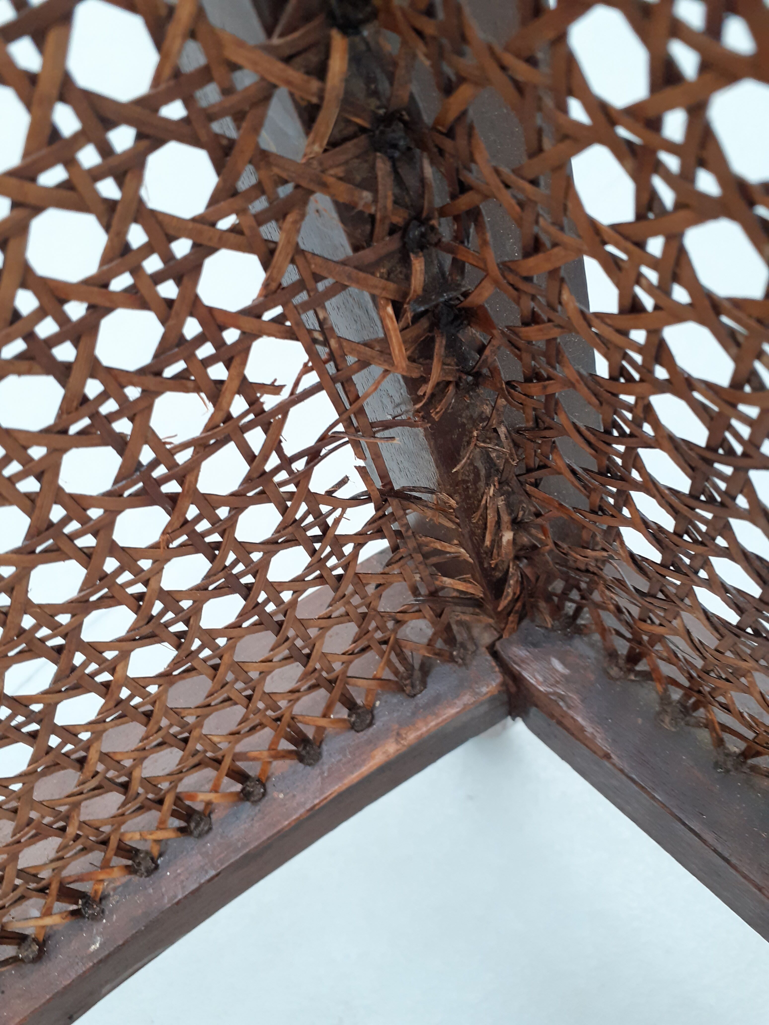 Colonial wooden armchair and cannage