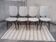Set of 4 white and wooden Scandinavian chairs.