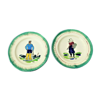 PAIR OF PLATES SIGNED GEC MR. AND MRS. FISHERMAN WITH FEET IN HOOVES