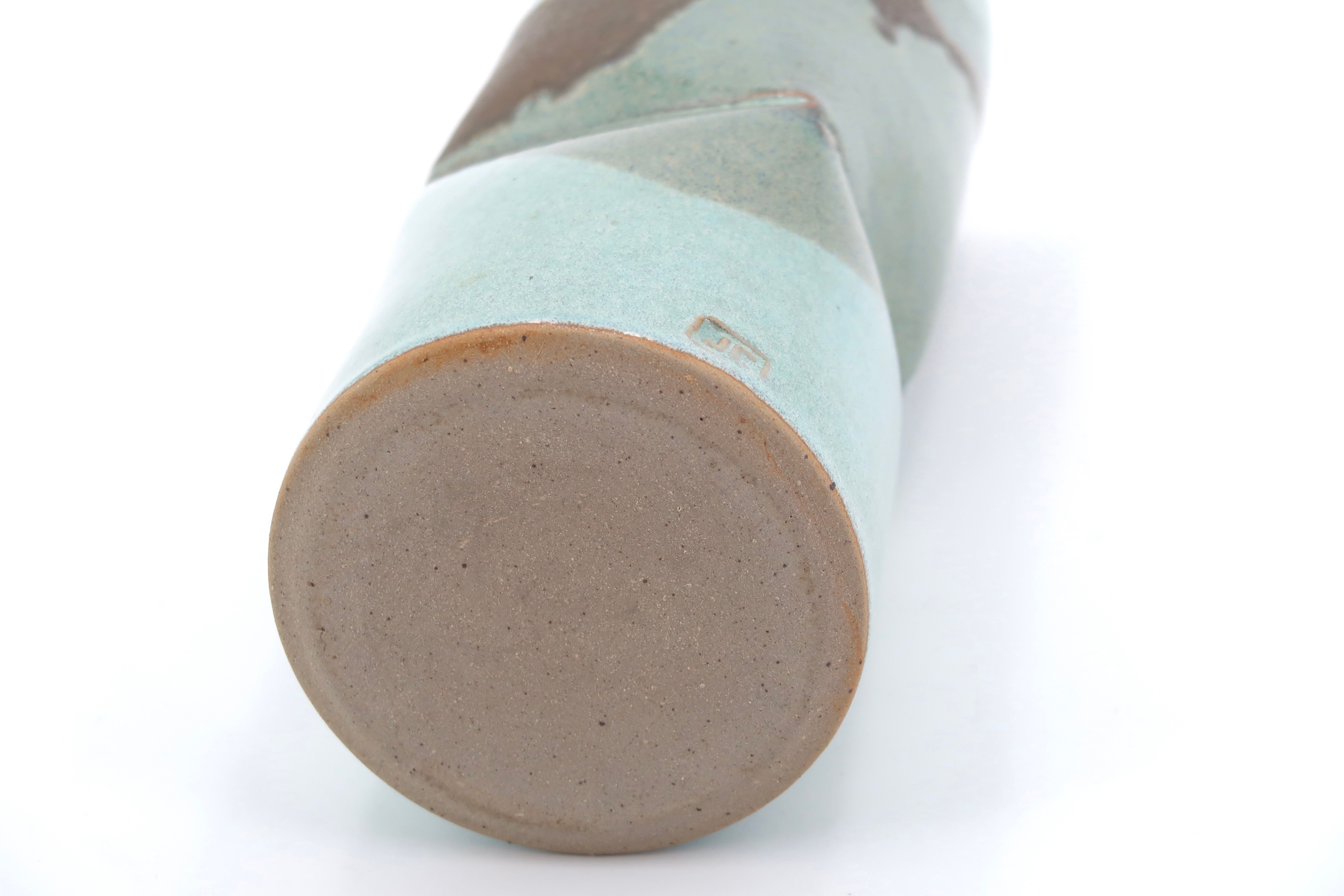 Blue vase with abstract ceramic decor by Jean Cacheleux