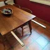 Compass foot table with extensions