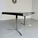 Smoked glass dining table with chrome legs, 1970s design by Roche Bobois.