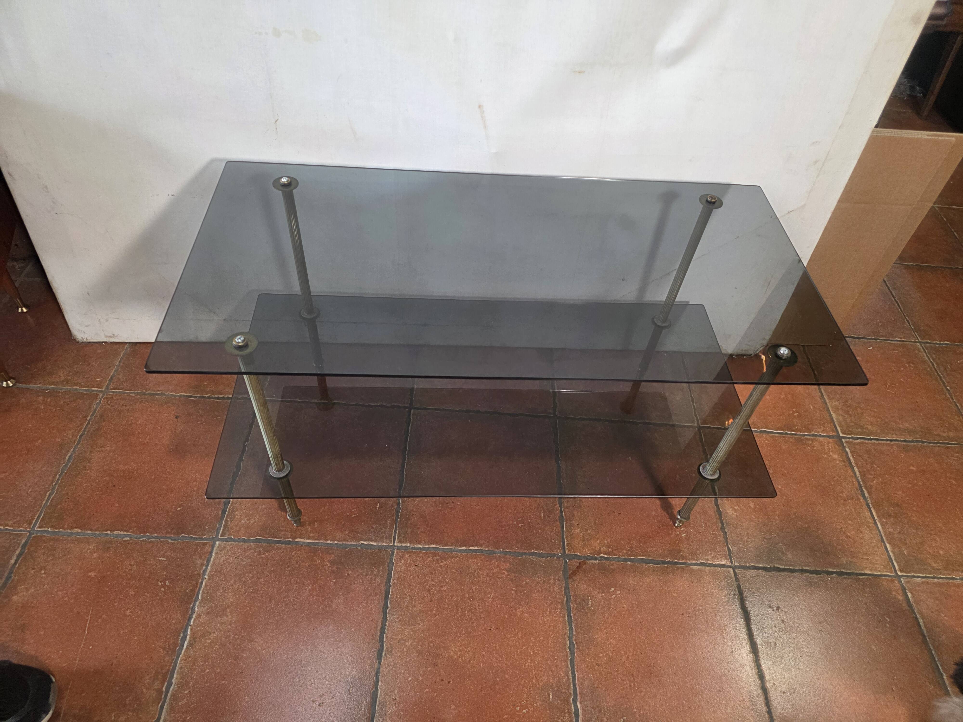 Smoked glass and brass coffee table from the 1970s.