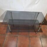 Smoked glass and brass coffee table from the 1970s.