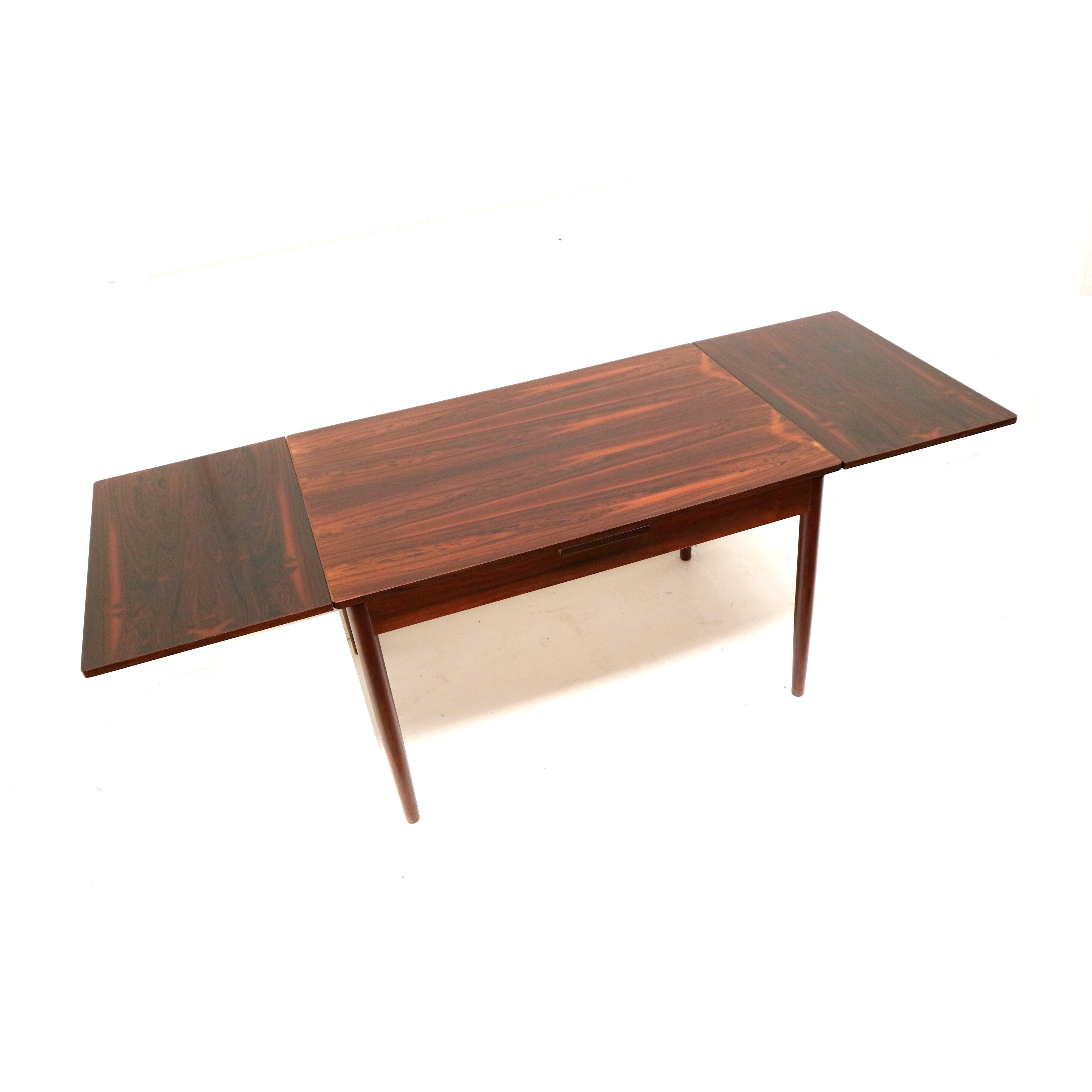 Vintage extendable rosewood dining table made in the 60s
