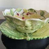 Cherry-decorated drainer fruit cup with its leaf-shaped dish