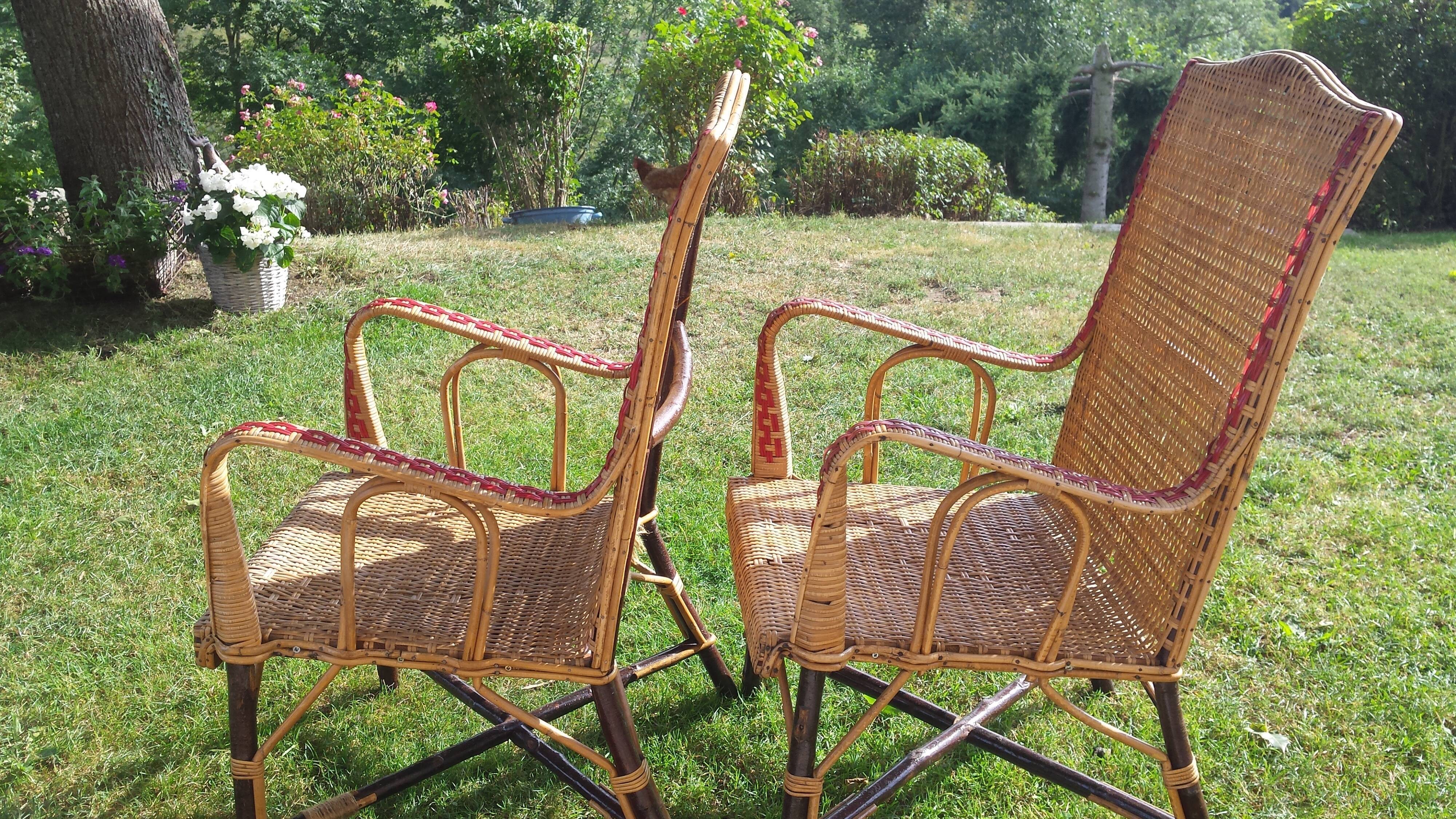 Wicker or rattan armchairs and bamboo