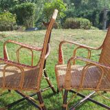 Wicker or rattan armchairs and bamboo