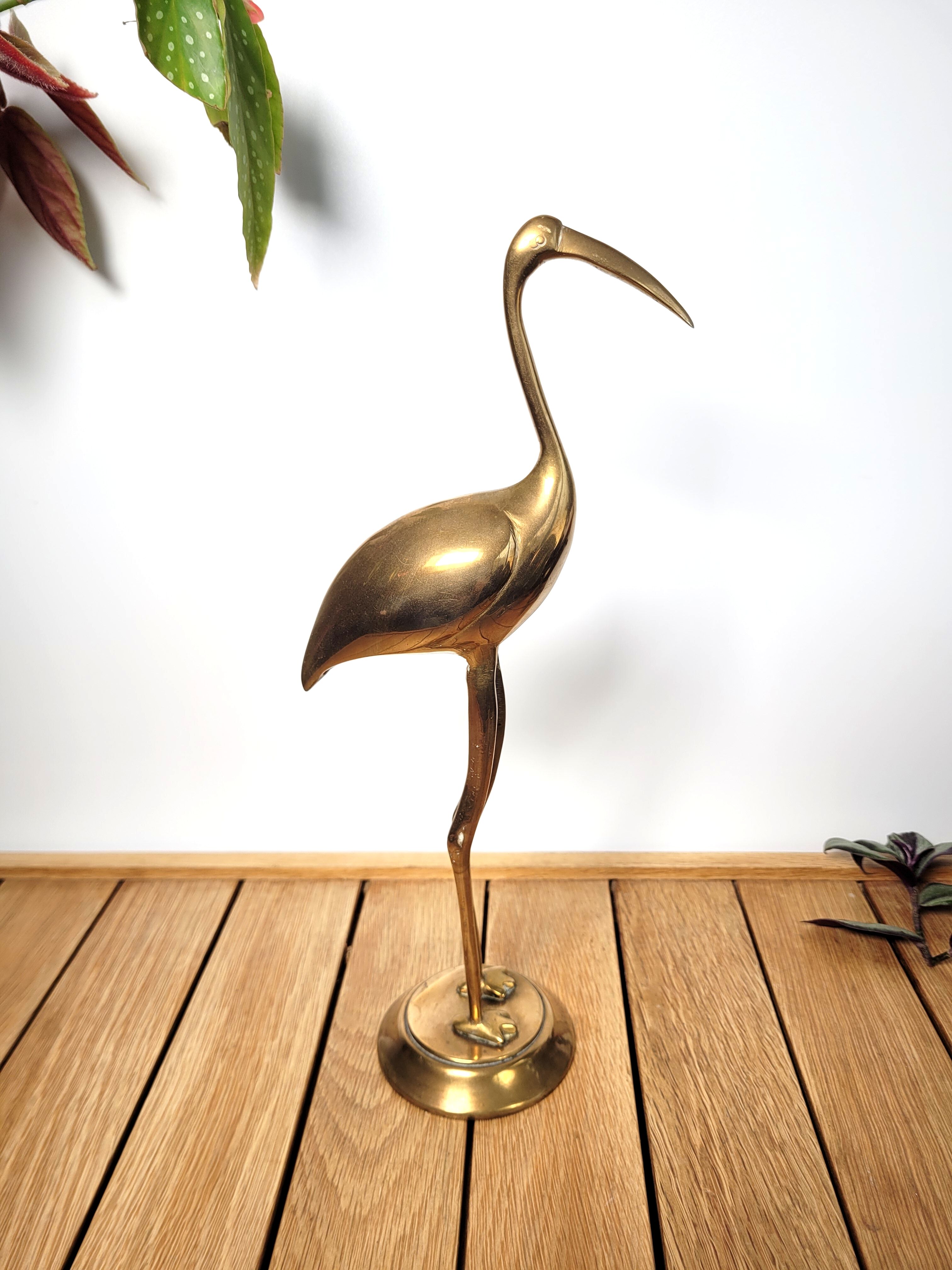 Golden brass blue heron