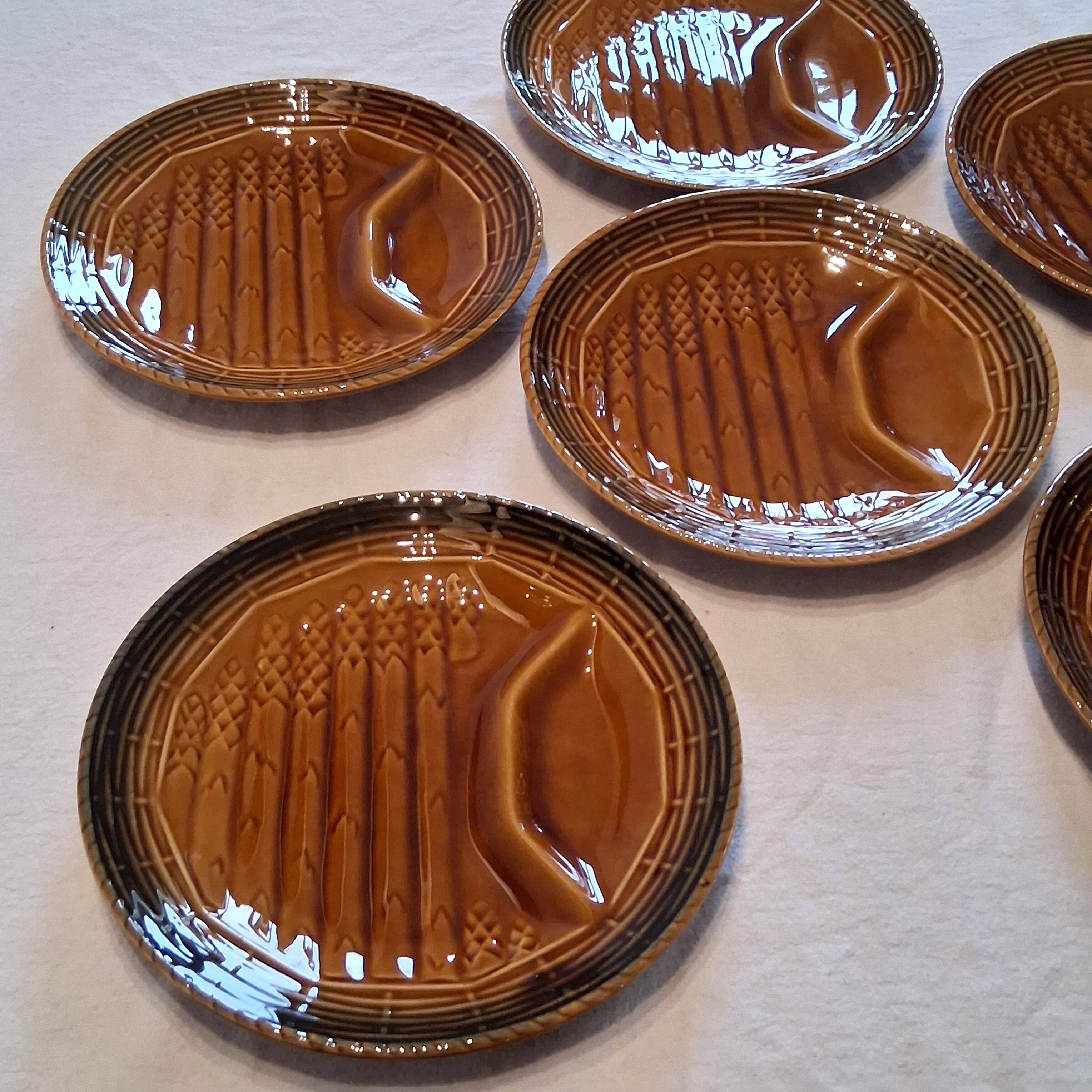 6 asparagus plates stamped "Sarreguemines" on the back in very good condition.