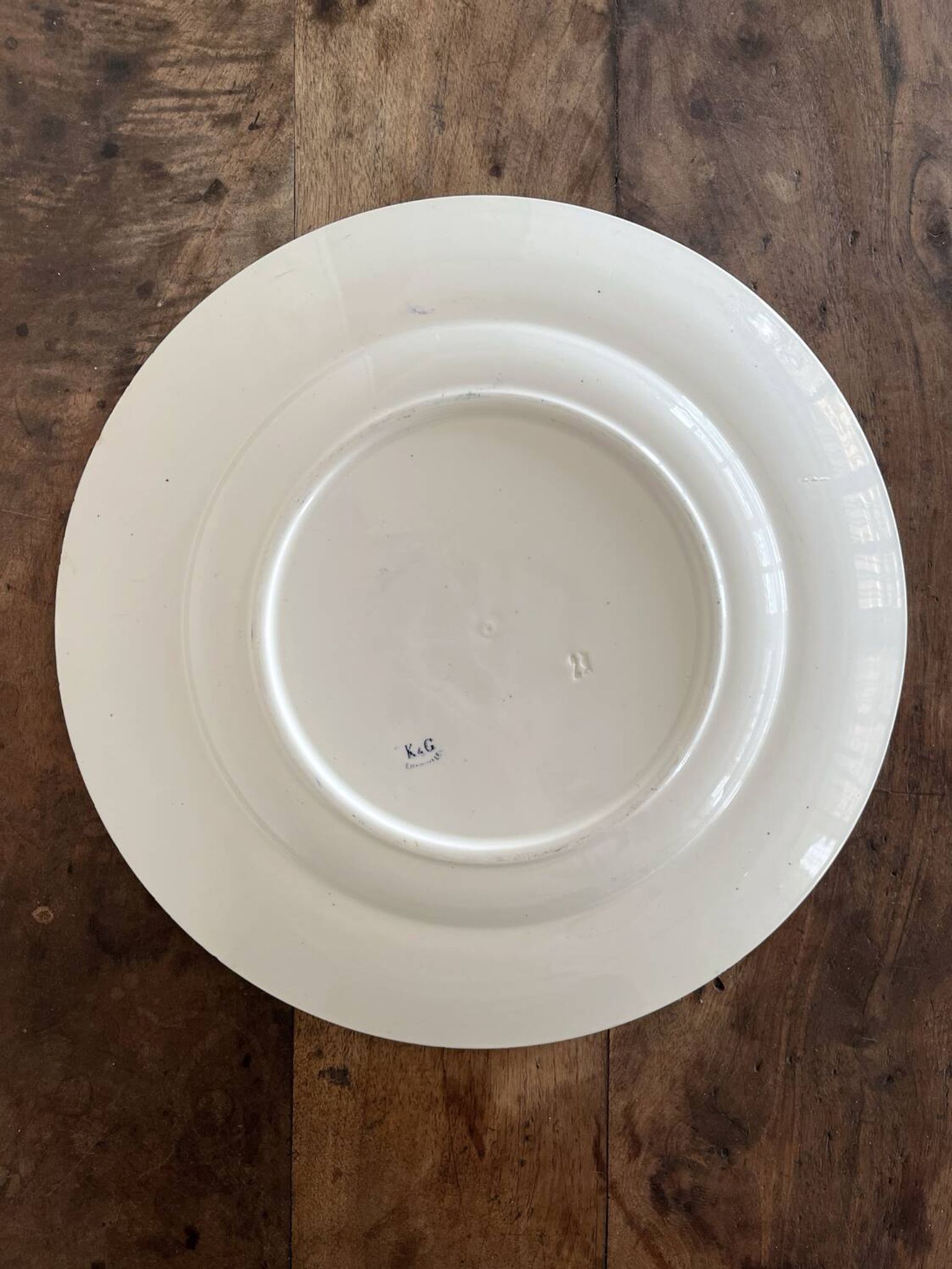 Round iron earth dish monogram “N” KG Lunéville