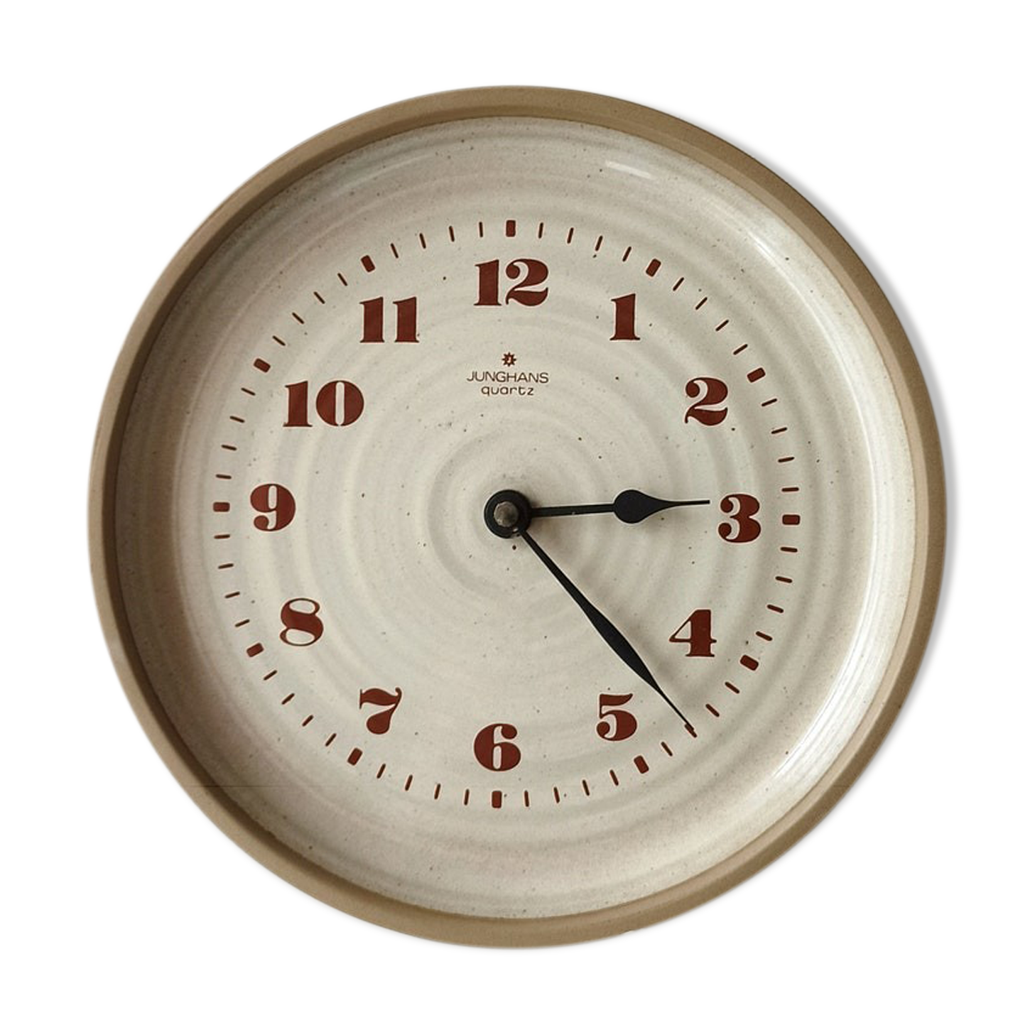 Clock in the shape of a round plate Junghans