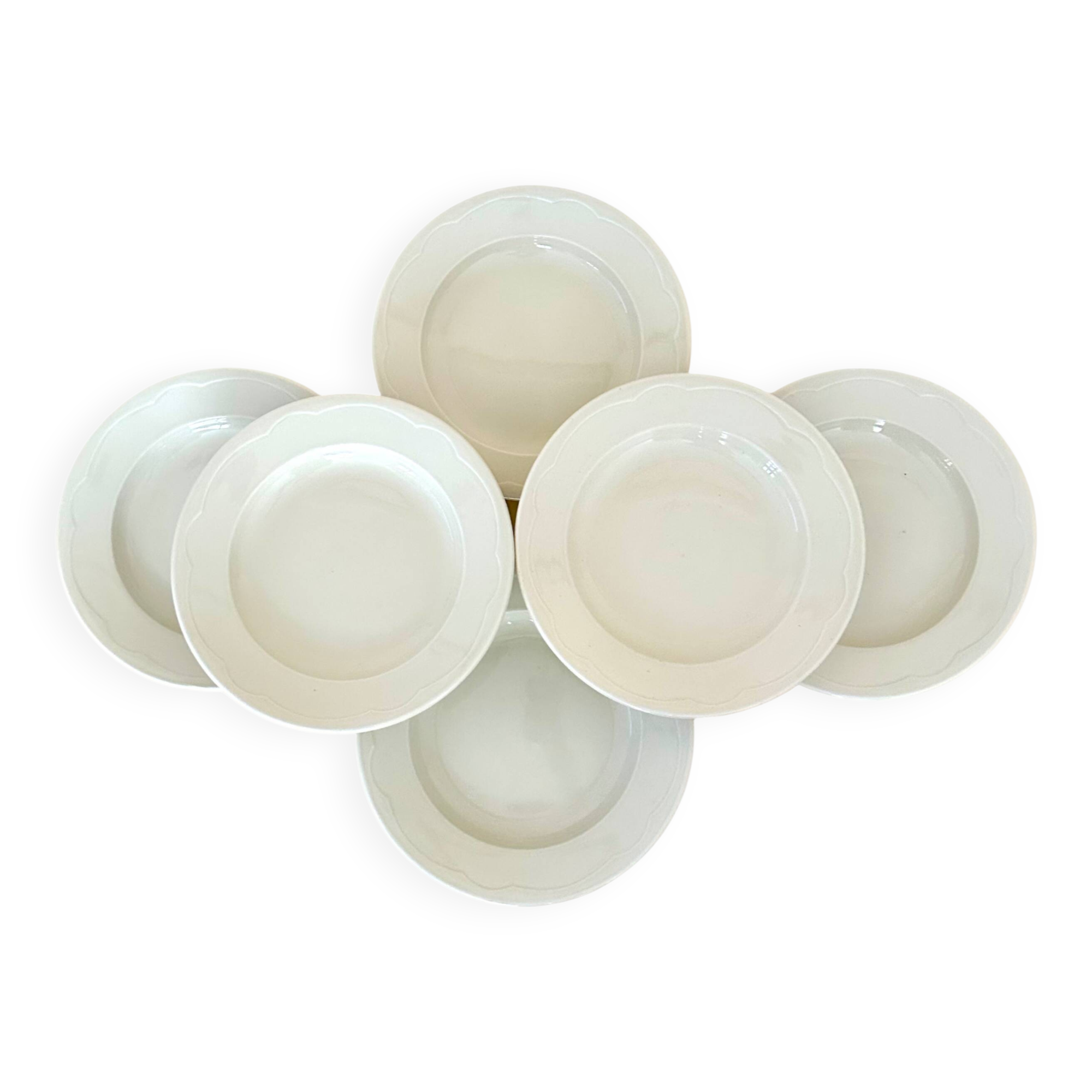 Set of six white porcelain deep plates by Pillivuyt.