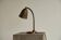 Art Deco table lamp in patinated brass from the 1930s.
