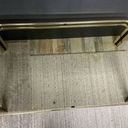 Vintage 1970s coffee table in gold metal and smoked glass.